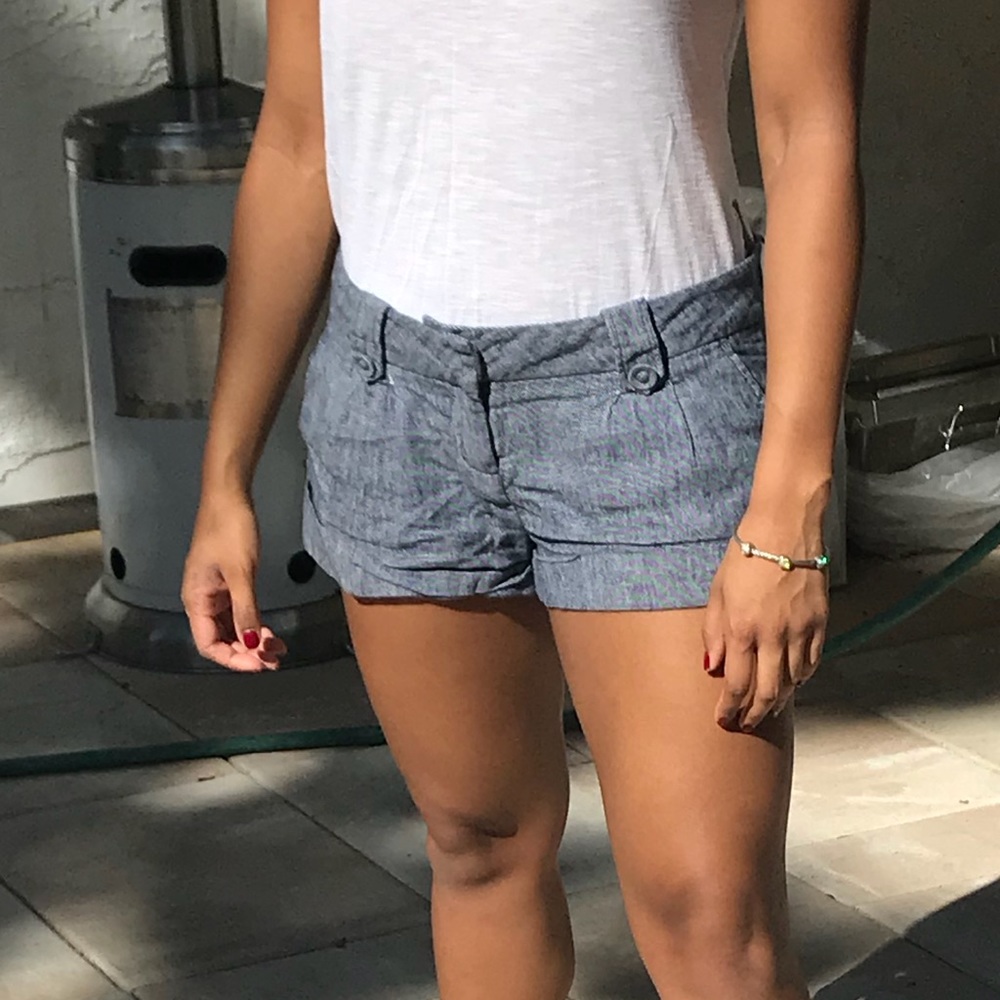 Blue short with blue and white thin stripes